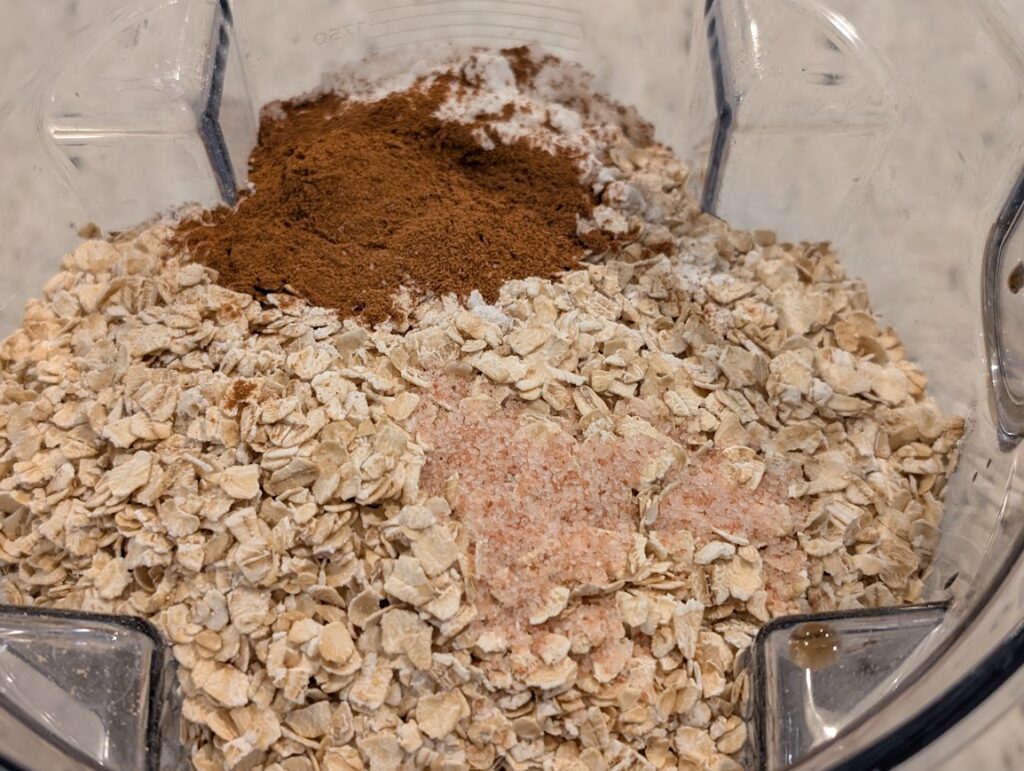 Oats, cinnamon, salt, and  other ingredients in Vitamix blender