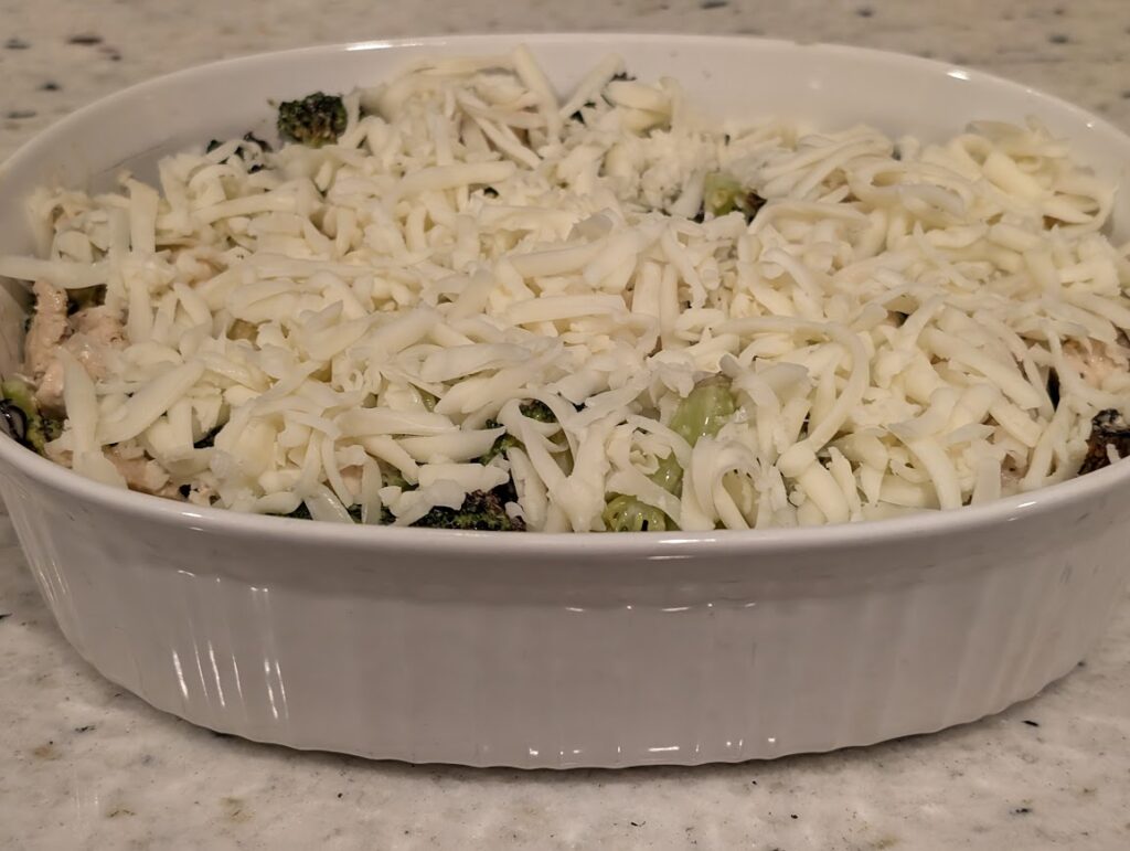 Chicken Veggie Alfredo Bake with Shredded Mozzarella Cheese on top