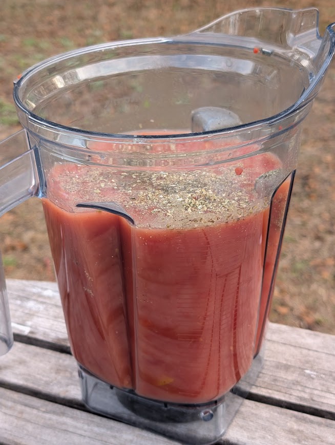 Easy Vitamix Tomato Soup in blender with seasonings