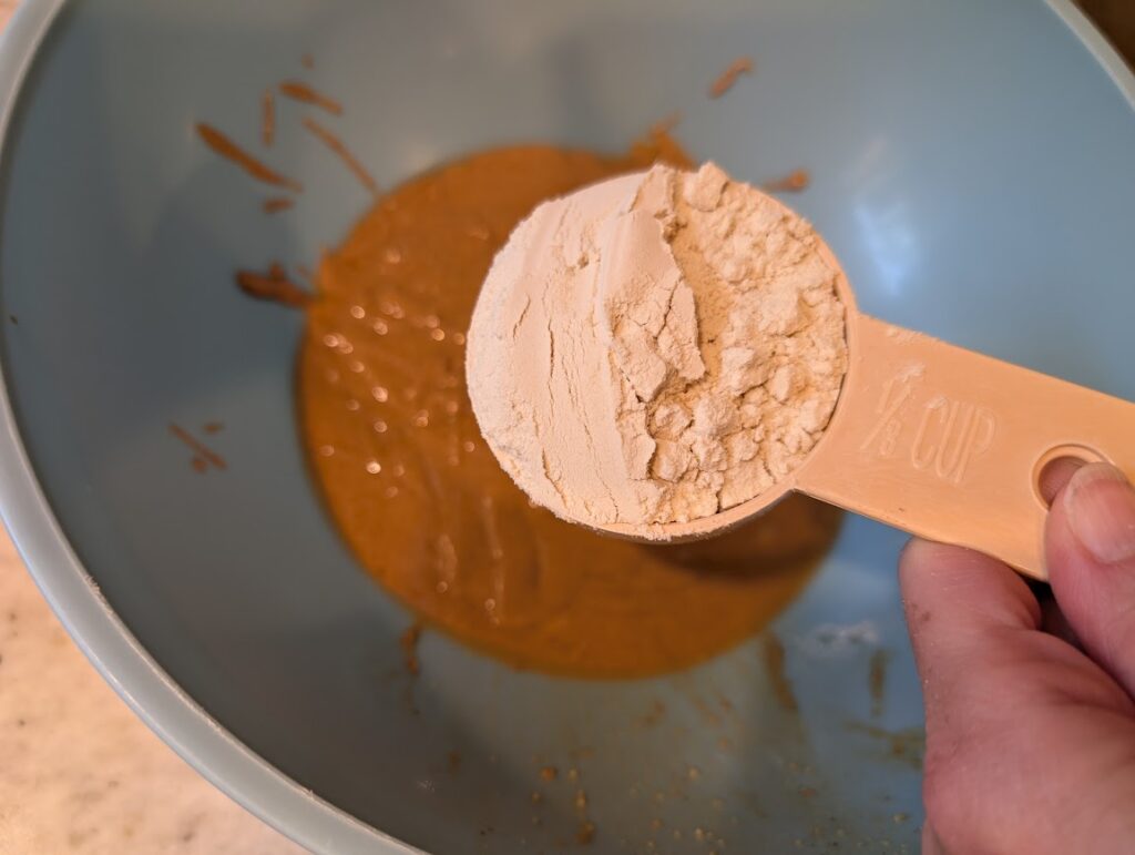 Adding flour and protein powder into this homemade protein pb cups recipe