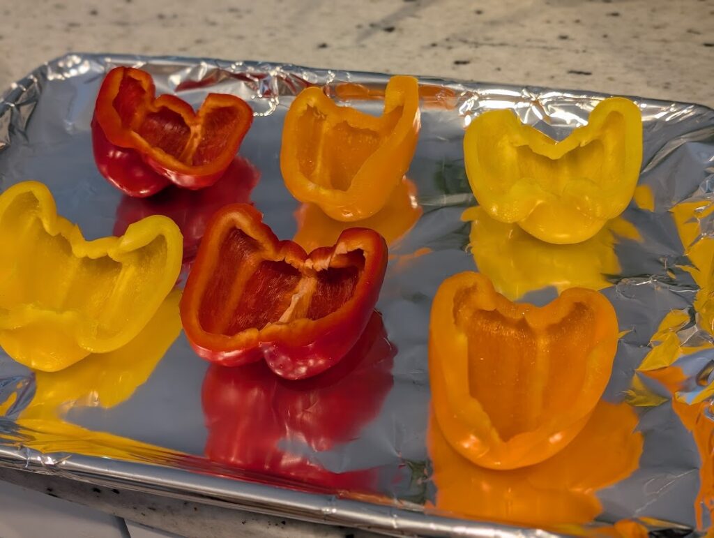 Peppers Cut into Bowl-Shape for Classic Stuffed Bell Pepper Recipe